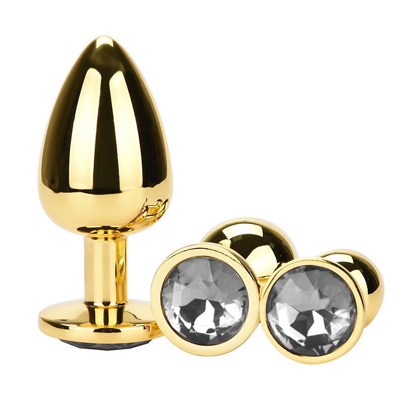 Plug Metálico Dorado con Joya